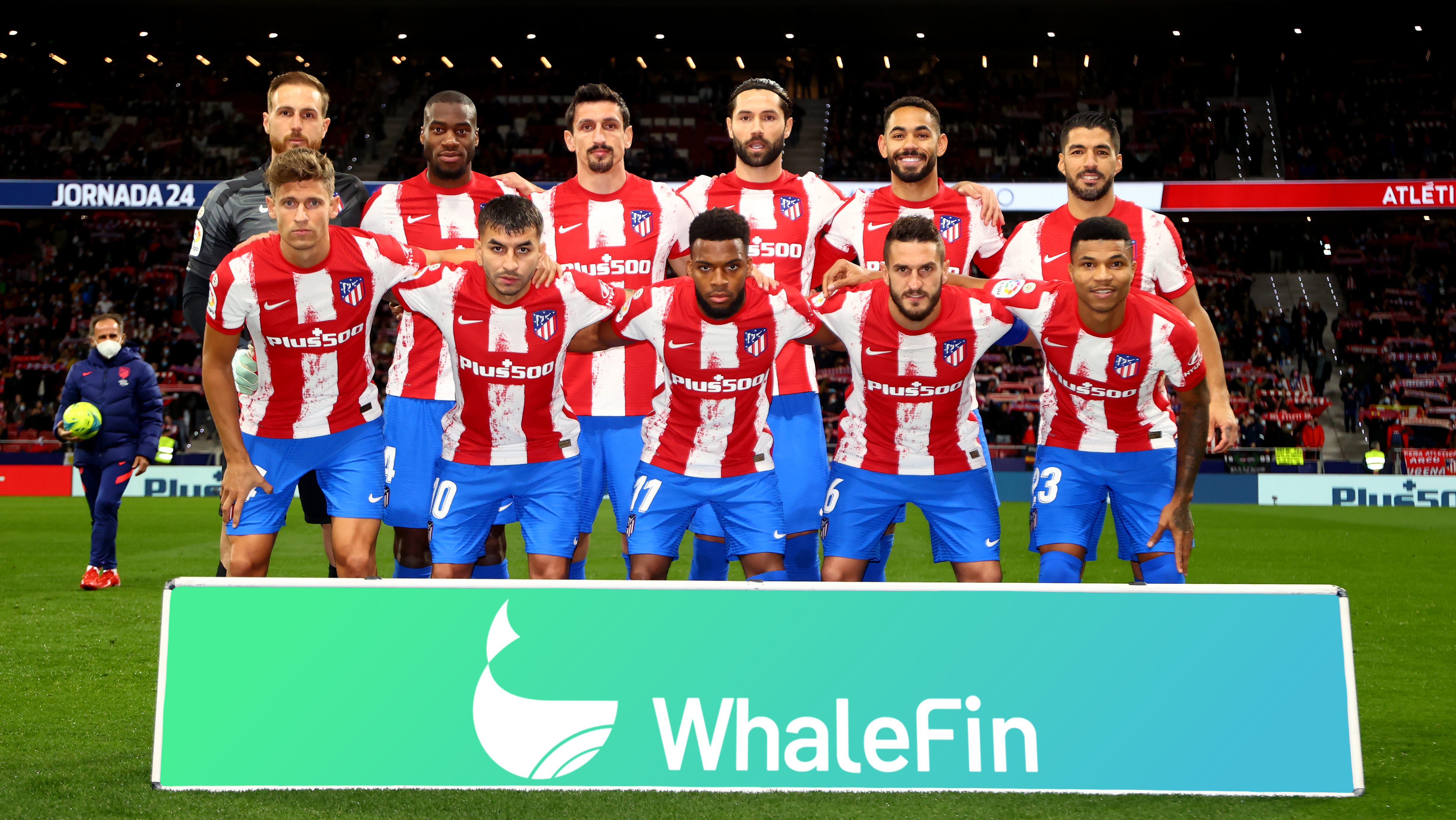 A football team gathered for a matchday portrait