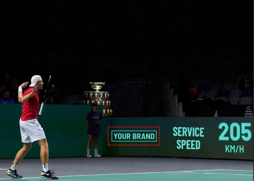 A tennis player competing with a brand message on court